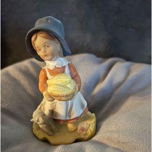 Grandma figurine with a bowl of corn and her cat $10